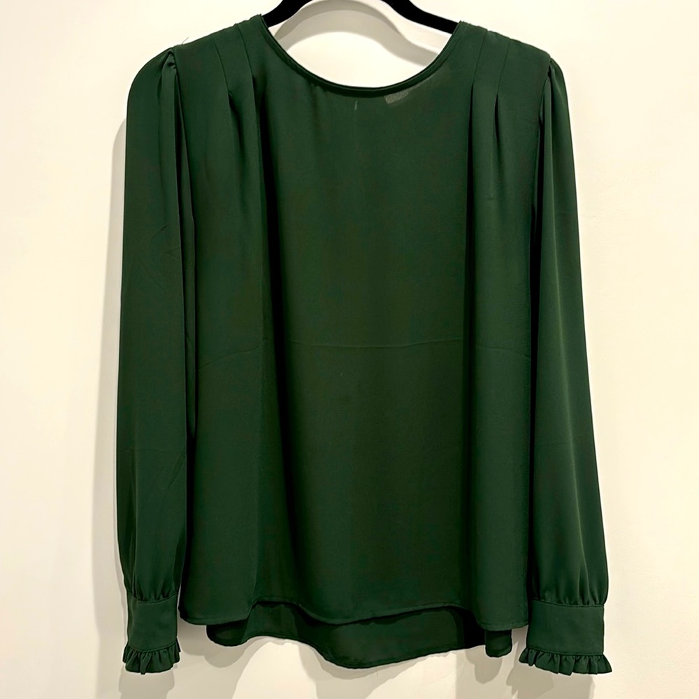 Forest green blouse with ruffle sleeves and gold button detail